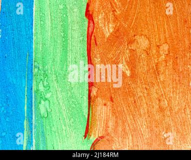 a wall painted unevenly with three colored paints Stock Photo