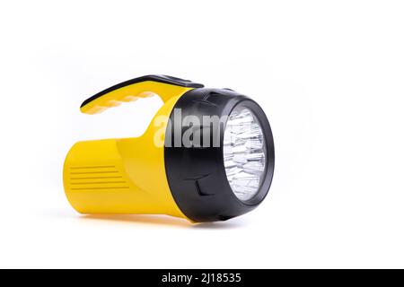 yellow and black flashlight on a white background Stock Photo