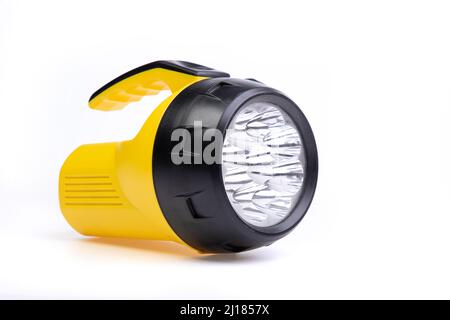 yellow and black flashlight on a white background Stock Photo