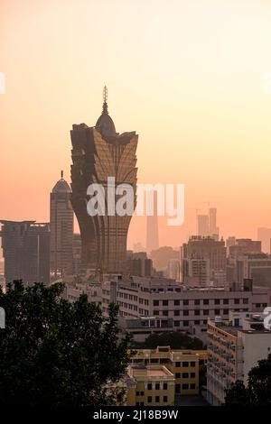 A vertical shot of the Grand Lisboa at sunset in Macau, China Stock Photo
