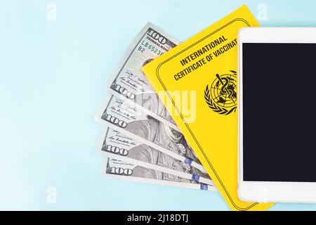 Buying a fake Vaccination passport for COVID-19 and his image displayed on with empty mock up screen smart phone. Buying fake certificates Stock Photo