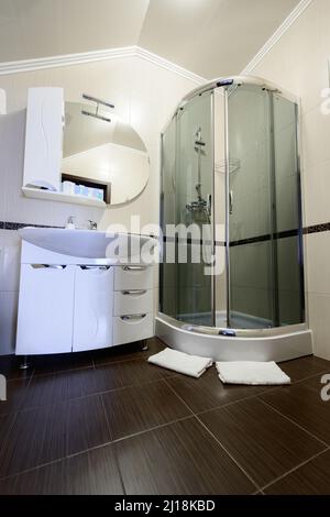 Bukovel, Ukraine February 4, 2022: bathroom with hydrobox, light style interior of the bathroom, baths in Bukovel hotels. Stock Photo