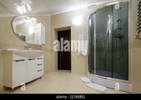 Bukovel, Ukraine February 4, 2022: bathroom with hydrobox, light style interior of the bathroom, baths in Bukovel hotels. Stock Photo