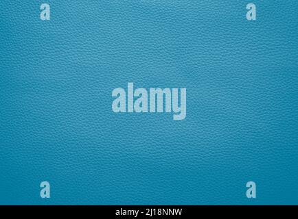 Close-up of detailed turquoise or light blue faux leather surface. High resolution full frame textured background. Stock Photo