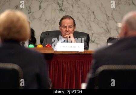 Washington, United States Of America. 23rd Mar, 2004. Washington, DC - March 23, 2004 -- Former New Jersey Governor Thomas H. Kean, Chairman, The National Commission on Terrorist Attacks Upon the United States (9/11 Commission), listens to testimony from former United States Secretary of State Madeleine Albright, left, and Ambassador Thomas Pickering, right, during its 8th Public Hearing in Washington, DC on March 23, 2004.Credit: Ron Sachs/CNP/Sipa USA [RESTRICTION: No New York Metro or other Newspapers within a 75 mile radius of New York City] Credit: Sipa USA/Alamy Live News Stock Photo