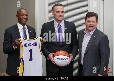 March 23, 2022: New LSU Head Basketball Coach Matt McMahon (center) poses with LSU Athletic Director Scott Woodward (right) and President William F. Tate IV (left) holds his first press conference and meets with the media for the first time at Tiger Stadium's Bill Lawton Room in Baton Rouge, LA. Jonathan Mailhes/CSM Stock Photo