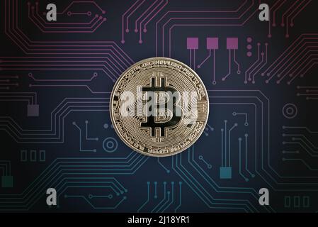 Bitcoin on electronic circuit board. Digital crypto currency concept Stock Photo