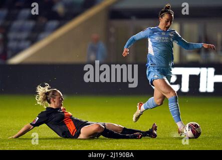 Manchester City's Lucy Bronze (right) gets past Everton's Lucy Graham during the Barclays FA Women's Super League match at the Academy Stadium, Manchester. Picture date: Wednesday March 23, 2022. Stock Photo