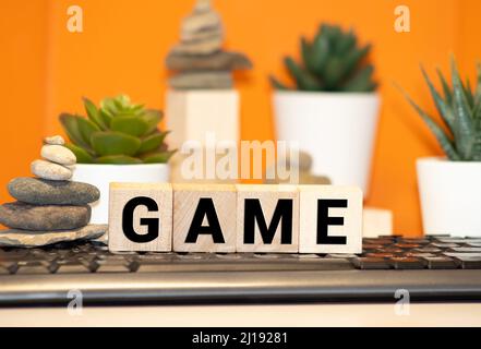 Game word created from Alphabet puzzle isloated on white background , with clipping path. Stock Photo