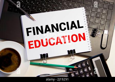 Financial education text on blackboard business concept Stock Photo