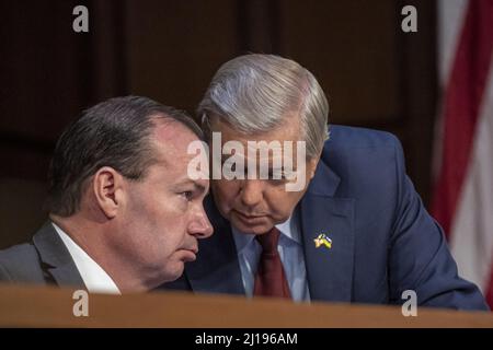 Sen. Lindsey Graham, R-S.C., right, speaks, with Vice President Mike ...