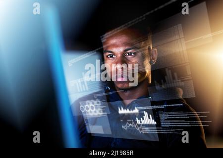 Analysing the information. Cropped shot of a young male programmer sifting through data streams while coding. Stock Photo