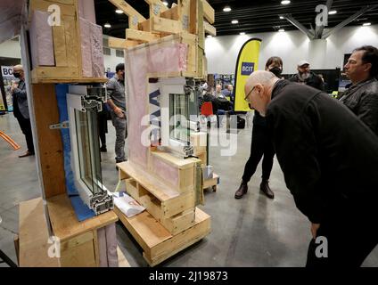 Vancouver, Canada. 23rd Mar, 2022. People look at wall construction ...