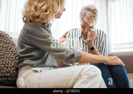 Tell me how youve been feeling. Shot of a woman comforting her friend. Stock Photo