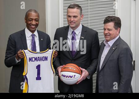 March 23, 2022: New LSU Head Basketball Coach Matt McMahon (center) poses with LSU Athletic Director Scott Woodward (right) and President William F. Tate IV (left) holds his first press conference and meets with the media for the first time at Tiger Stadium's Bill Lawton Room in Baton Rouge, LA. Jonathan Mailhes/CSM Stock Photo