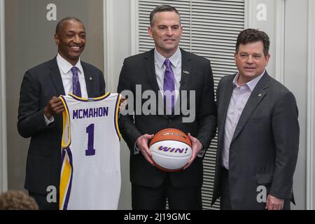 March 23, 2022: New LSU Head Basketball Coach Matt McMahon (center) poses with LSU Athletic Director Scott Woodward (right) and President William F. Tate IV (left) holds his first press conference and meets with the media for the first time at Tiger Stadium's Bill Lawton Room in Baton Rouge, LA. Jonathan Mailhes/CSM Stock Photo