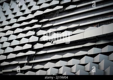 modern Aluminium composite material architecture gray color and Hexagon shape popup texture on exterior facade building. Stock Photo