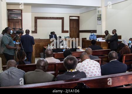 People follow proceedings during the hearing of the Mau Forest eviction case at Nakuru Environment and Land Court. To conserve Mau Forest, the government of Kenya had forcefully evicted more than 50,000 people who reside in the forest land. In the ongoing court hearing, witnesses said they possessed legal land titles issued by the government. In 2017, The Ogiek, an indigenous minority forest dwelling community, won a landmark case at The African Court on Human and People's Rights based in Arusha, Tanzania. In this case, the Government of Kenya had violated the community's rights by evicting th Stock Photo