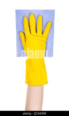 hand in yellow rubber glove holds flat blue rag isolated on white background Stock Photo