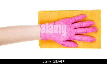 hand in pink vinyl glove holds flat yellow rag isolated on white background Stock Photo