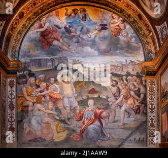 Milan, Lombardy, Italy, Europe. Church of San Maurizio al Monastero Maggiore. Martyrdom of St. Stephen, fresco by Evangelista Luini, realised in 1550 ca., situated in Carreto Chapel. Stock Photo