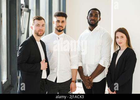 Group of multiracial company employees in the office Stock Photo