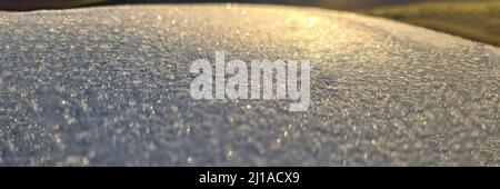 Bright sunlight on white frosty surface background Stock Photo