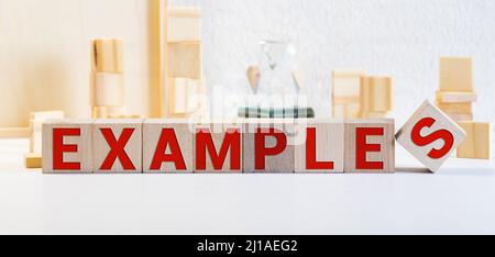 Examples Word Written On Wood Block. Examples Text On Table, Concept ...