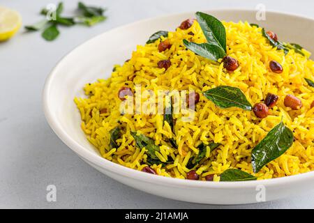 South Indian Rice Dish with Lemon and Curry Leaves Stock Photo