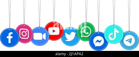 Kiev, Ukraine - July 03, 2021: Popular round paper apps icons hanging by a thread: Facebook, Instagram, Twitter, Youtube, WhatsApp, and others. Vector Stock Vector