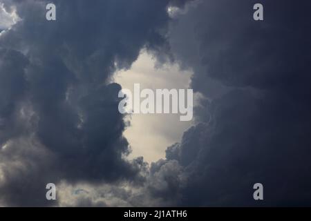 Wolkenloch, Gewitterwolken  /  Cloud hole, storm clouds (Aufnahmedatum kann abweichen) Stock Photo