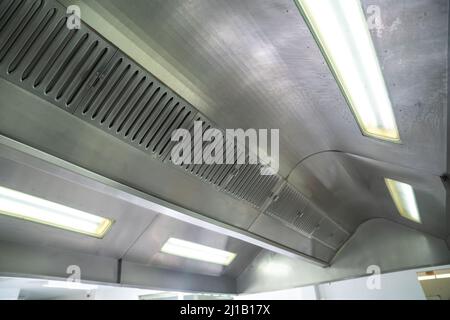 hood in restaurant kitchen of a professional kitchen. Modern kitchen. Stock Photo