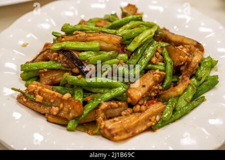 A delicious Chinese dish, Braised Beans with Eggplant Stock Photo