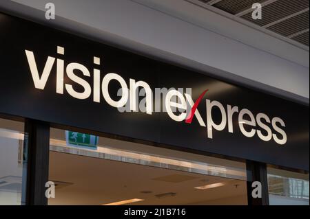 Belfast, UK- Feb 21, 2022:The sign for Vision Express in Belfast Northern Ireland. Stock Photo