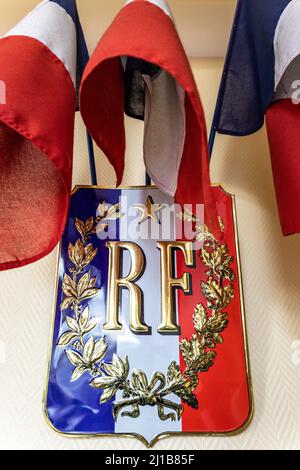 FRENCH FLAG AND PLAQUE OF THE FRENCH REPUBLIC, MAYOR'S OFFICE OF NEUVE-LYRE, EURE, NORMANDY, FRANCE Stock Photo