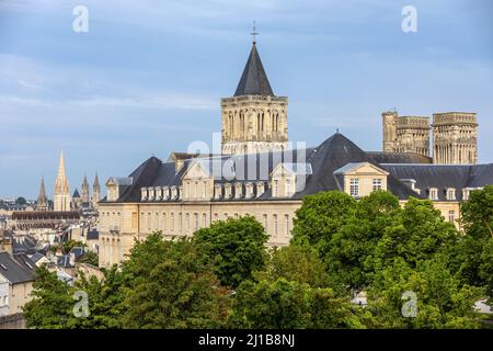 BELL TOWER AND TOWERS OF THE ABBAYE AUX DAMES, FORMER MONASTERY OF BENEDICTINE MONKS THAT TODAY HOUSES THE REGIONAL COUNCIL OF NORMANDY, CAEN, CALVADOS, NORMANDY, FRANCE Stock Photo