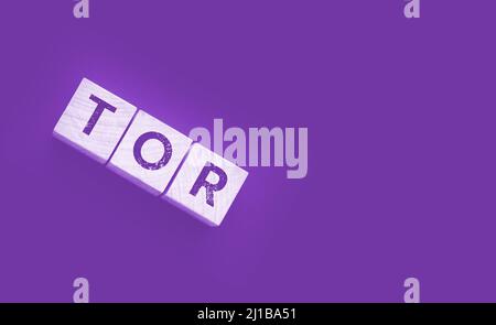 Tor anonymous by letters on a woden blocks on black. Business concept. Stock Photo