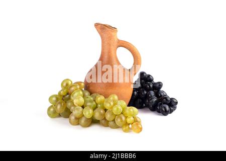 Georgian traditional clay vessel jug(doqi) for wine and grapes on white isolated background. Stock Photo