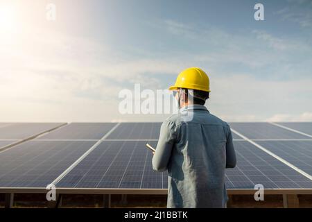 Renewable Energy Power Plant Technician, Solar Panel in Thailand Stock Photo