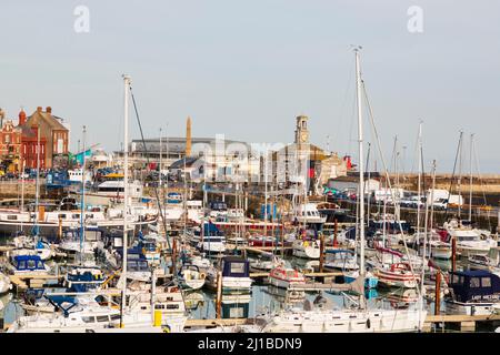 View across the marina, with the Maritime museum and Victoria Pavilion. Royal harbour, Ramsgate, Kent, England. Full of yachts and pleasure boats. Stock Photo