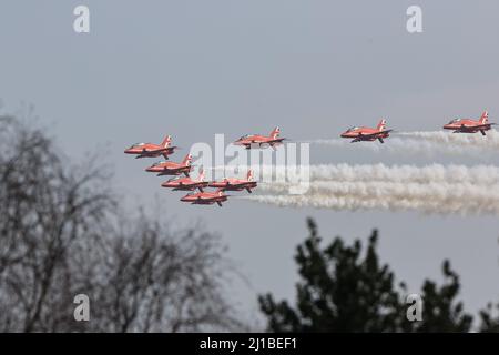 Leeming Bar, UK. 24th Mar, 2022. The Red Arrows file over RAF Leeming as part of the 100 Squadron disbandment at RAF Leeming in Leeming Bar, United Kingdom on 3/24/2022. (Photo by Mark Cosgrove/News Images/Sipa USA) Credit: Sipa USA/Alamy Live News Stock Photo