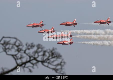 Leeming Bar, UK. 24th Mar, 2022. The Red Arrows file over RAF Leeming as part of the 100 Squadron disbandment at RAF Leeming in Leeming Bar, United Kingdom on 3/24/2022. (Photo by Mark Cosgrove/News Images/Sipa USA) Credit: Sipa USA/Alamy Live News Stock Photo