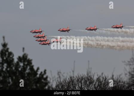 Leeming Bar, UK. 24th Mar, 2022. The Red Arrows file over RAF Leeming as part of the 100 Squadron disbandment at RAF Leeming in Leeming Bar, United Kingdom on 3/24/2022. (Photo by Mark Cosgrove/News Images/Sipa USA) Credit: Sipa USA/Alamy Live News Stock Photo