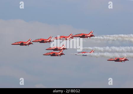 Leeming Bar, UK. 24th Mar, 2022. The Red Arrows file over RAF Leeming as part of the 100 Squadron disbandment at RAF Leeming in Leeming Bar, United Kingdom on 3/24/2022. (Photo by Mark Cosgrove/News Images/Sipa USA) Credit: Sipa USA/Alamy Live News Stock Photo