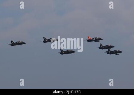 Leeming Bar, UK. 24th Mar, 2022. RAF 100 Squadron Hawks fly past RAF Leeming as part of their disbandment in Leeming Bar, United Kingdom on 3/24/2022. (Photo by Mark Cosgrove/News Images/Sipa USA) Credit: Sipa USA/Alamy Live News Stock Photo