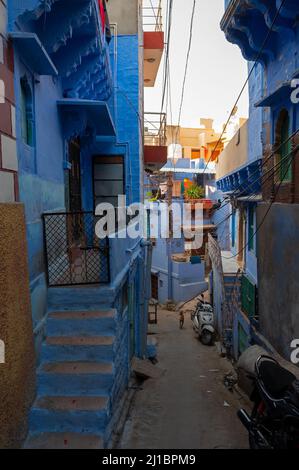 Jodhpur, Rajasthan, India - October 21st, 2019 : Traditional Blue coloured house with stair cases with Goddess Laxmi's symbolic stepping into house. Stock Photo