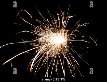 yellow sparkler holiday background on black Stock Photo