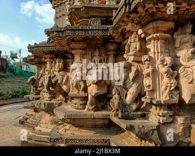a photo of ruined ancient sculpture of Hindu trinity god sitting on elephant Stock Photo