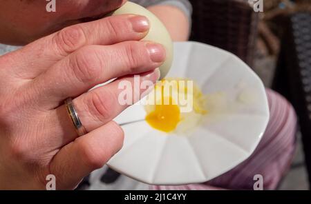Blow out an egg for Easter Stock Photo