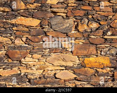Natural stone wall background texture Stock Photo